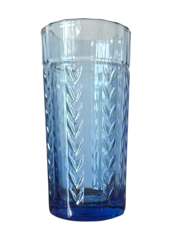 Actual Product Image - Blue glass tumbler with a textured design on a white background