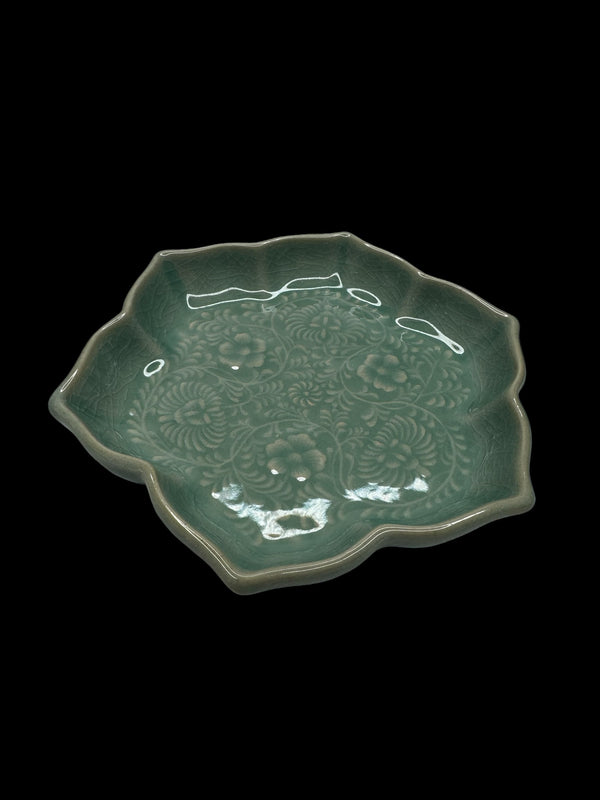 Actual Product Image - Decorative green ceramic plate with floral patterns on a black background
