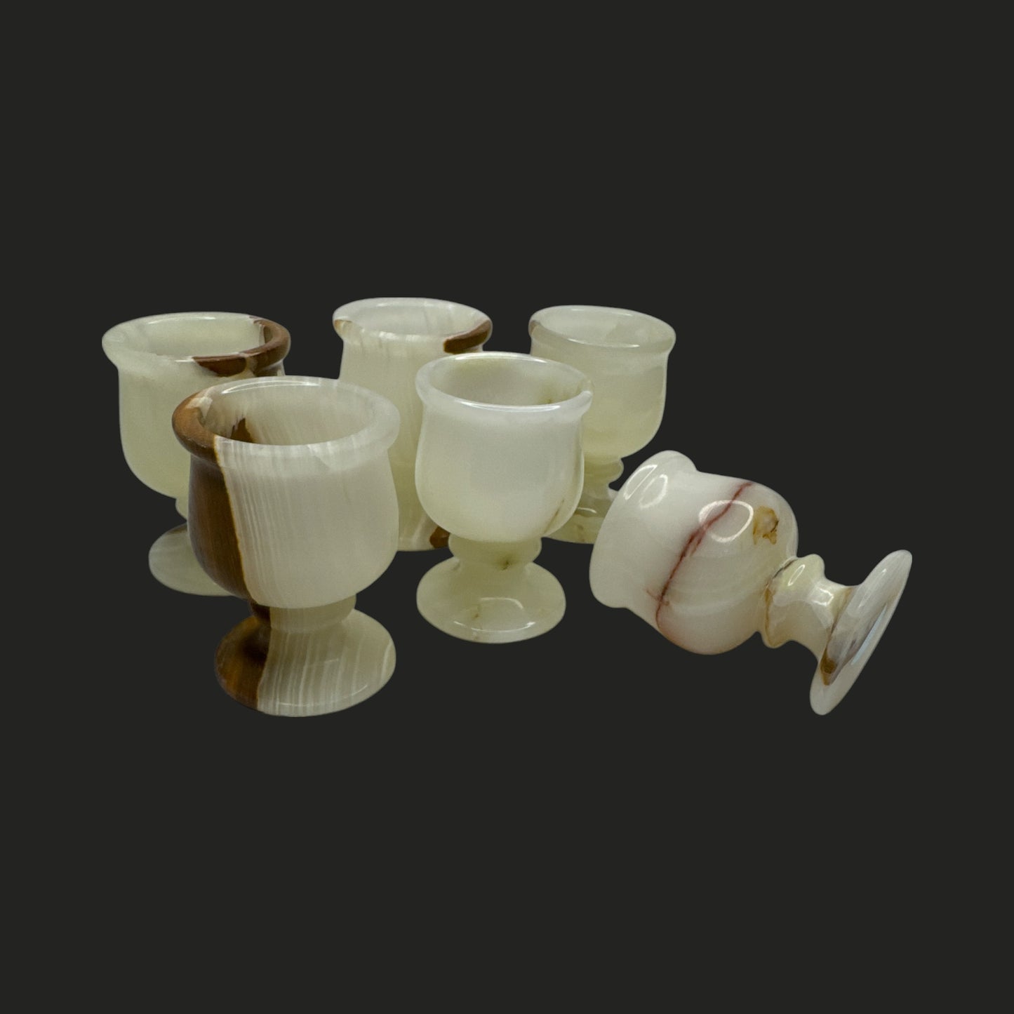 Actual Product Image - Set of white glass goblets with brown accents on a black background