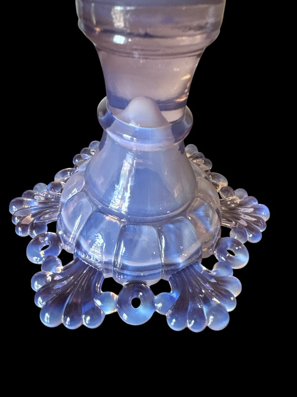 Actual Product Image - Clear glass candle holder with decorative base on a black background